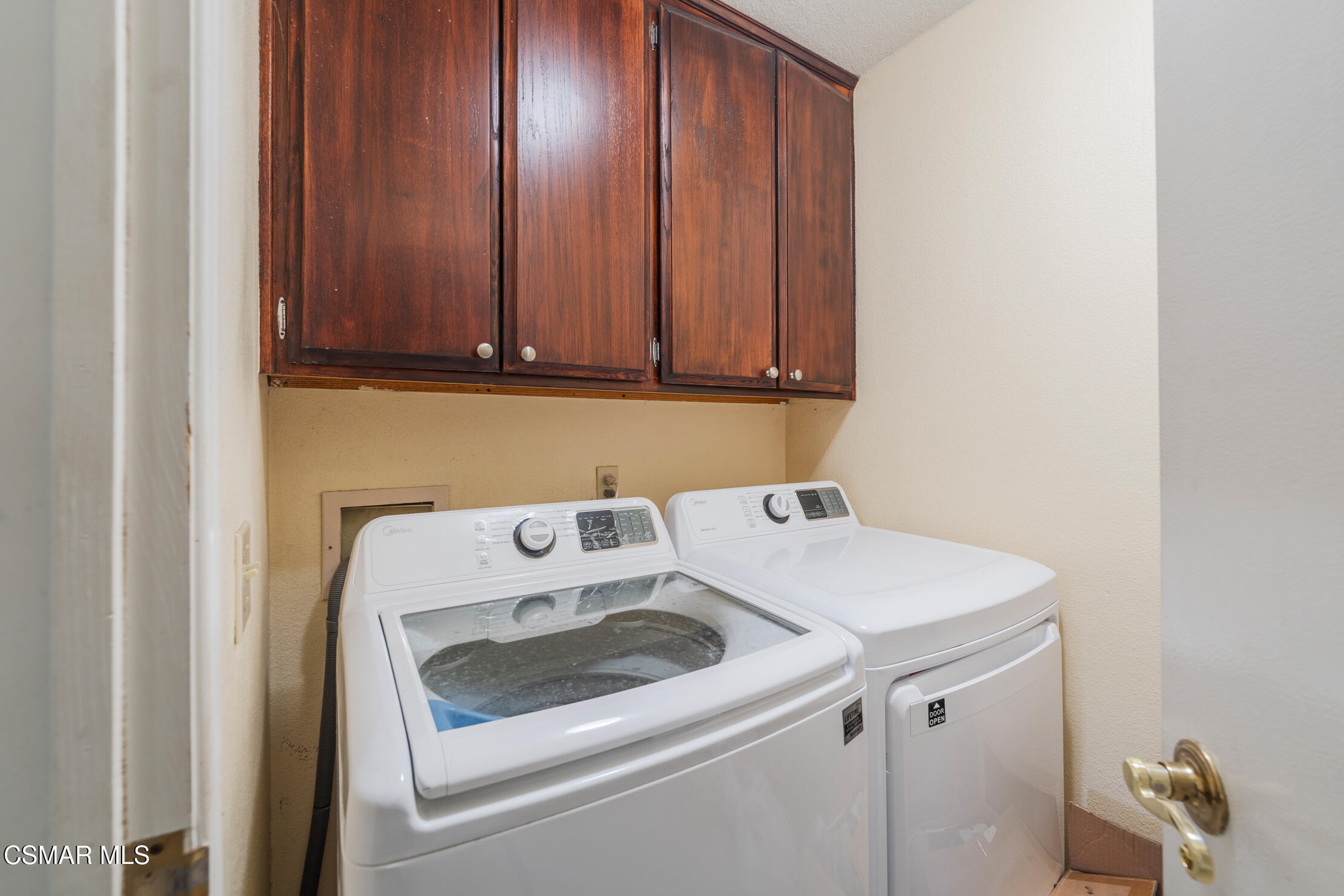 1917 Fitzgerald Road Simi Valley, CA 93065 - Photo 36 of 55 a utility room with dryer and washer