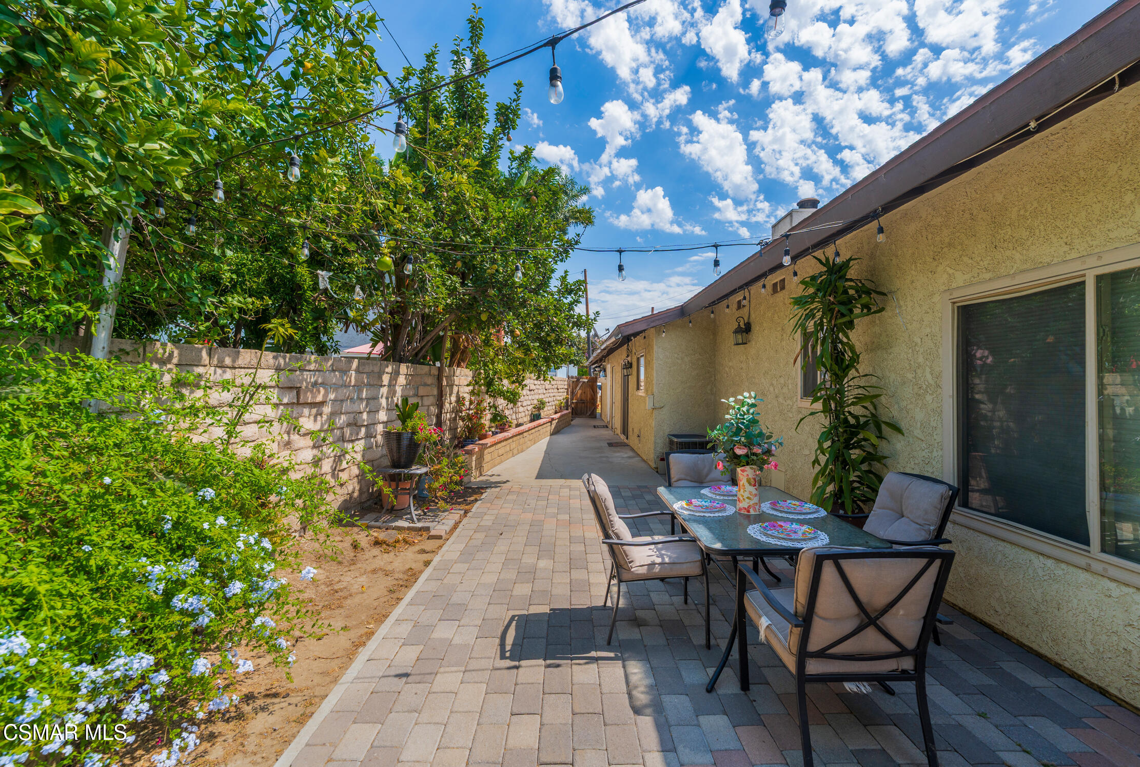 1917 Fitzgerald Road Simi Valley, CA 93065 - Photo 41 of 55 a backyard of a house with table and chairs