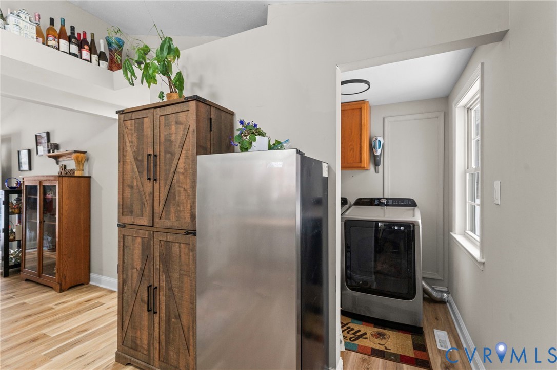 675 Goldmine Road Louisa, VA 23093 - Photo 19 of 29 a kitchen with metallic refrigerator freezer and a dishwasher