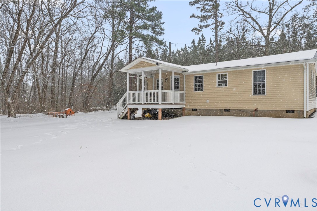 675 Goldmine Road Louisa, VA 23093 - Photo 28 of 29 a view of a house with a yard covered in snow