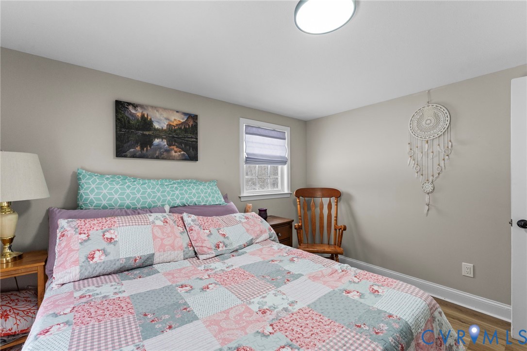 675 Goldmine Road Louisa, VA 23093 - Photo 10 of 29 a bedroom with a bed and a table