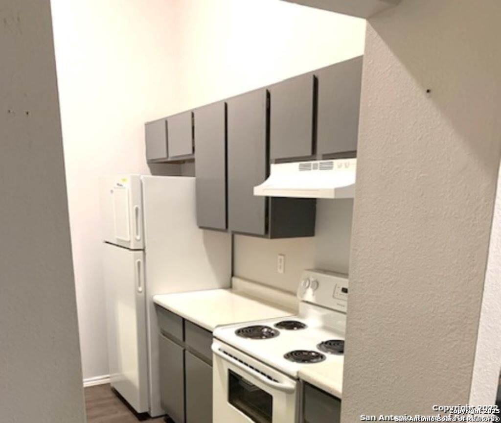 5230 Meadow Rise Street San Antonio, TX 78250 - Photo 11 of 30 a bathroom with a sink and a mirror