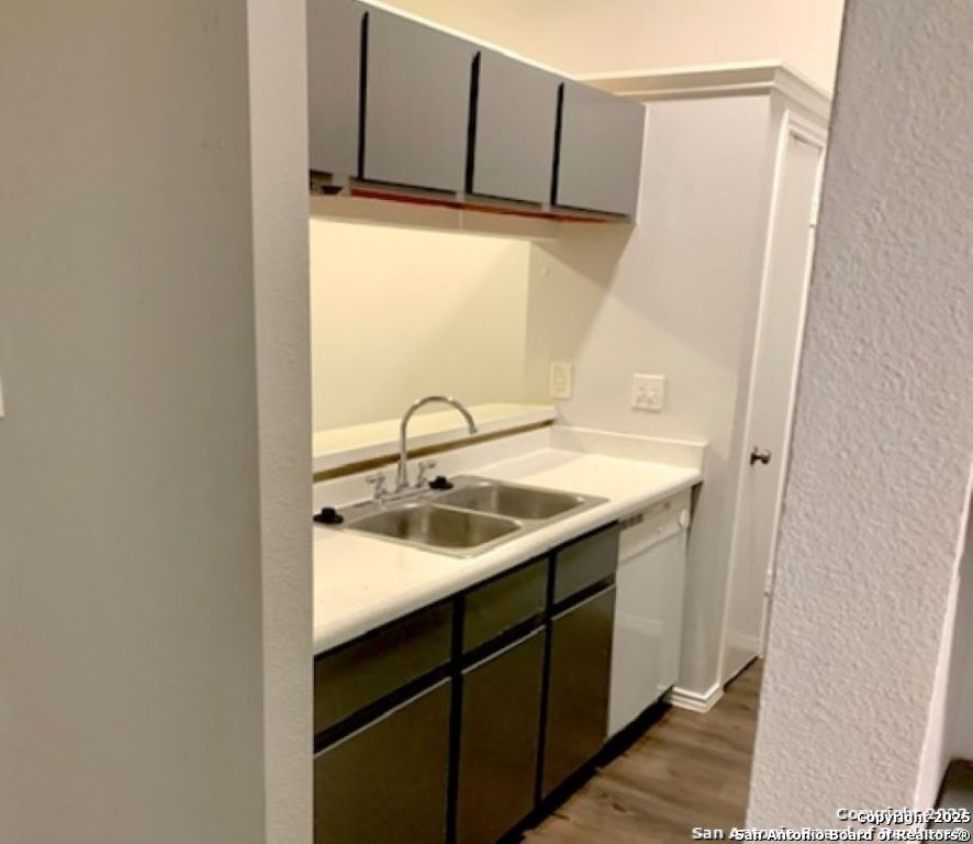 5230 Meadow Rise Street San Antonio, TX 78250 - Photo 12 of 30 a bathroom with a sink and mirror