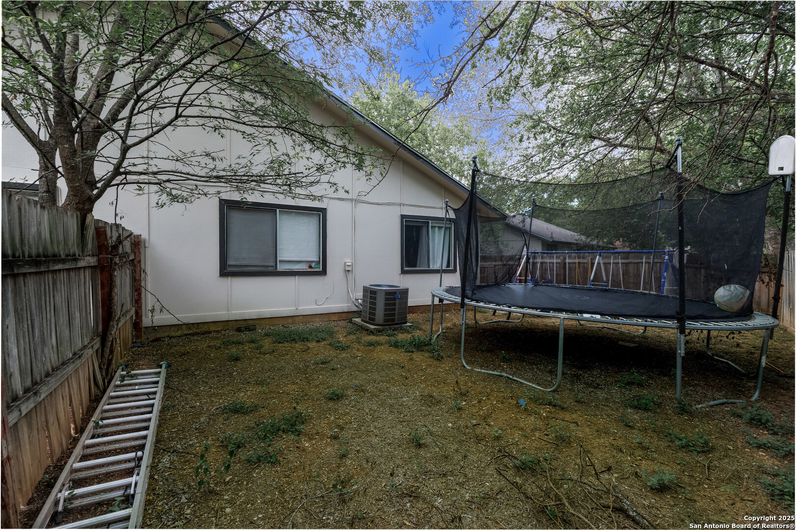5230 Meadow Rise Street San Antonio, TX 78250 - Photo 6 of 30 a view of backyard with deck and outdoor seating