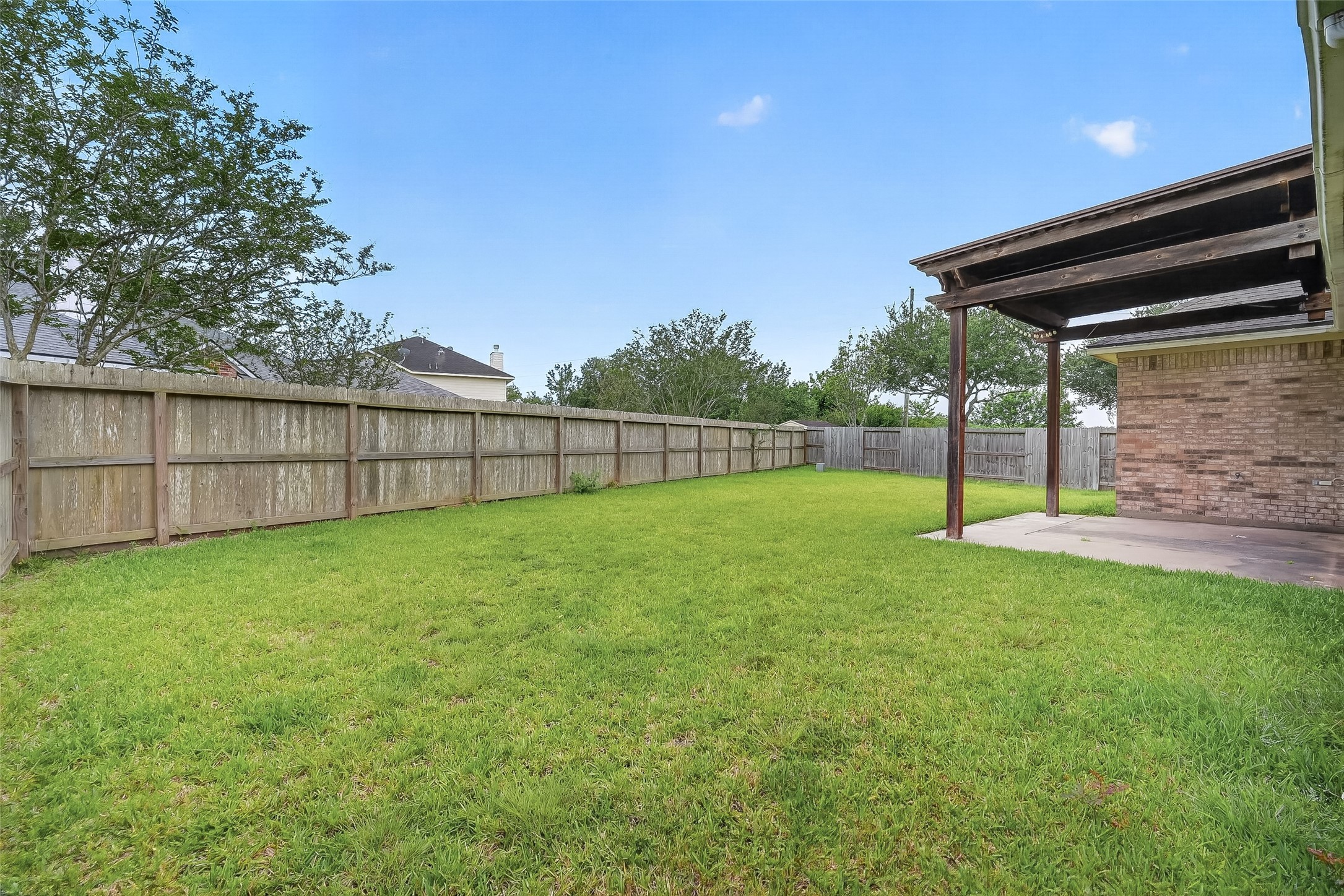 14308 Rocky Briar Lane Rosharon, TX 77583 - Photo 43 of 46 a view of backyard with wooden fence