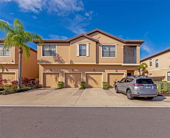 a car parked in front of a house