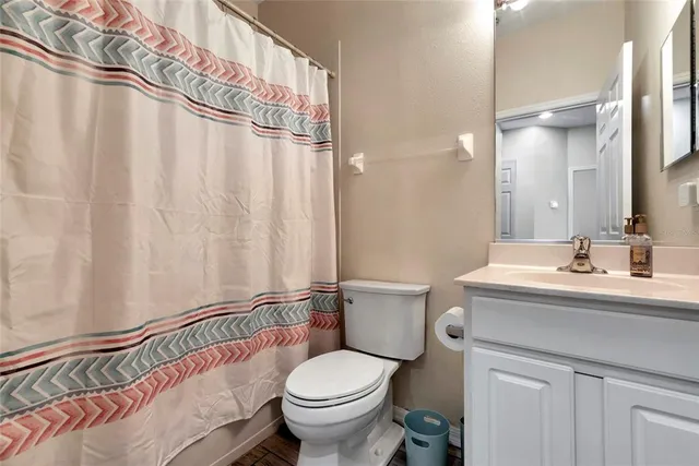a view of bathroom with a washer and dryer