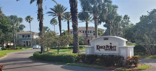 a large dining space with lots of furniture and window