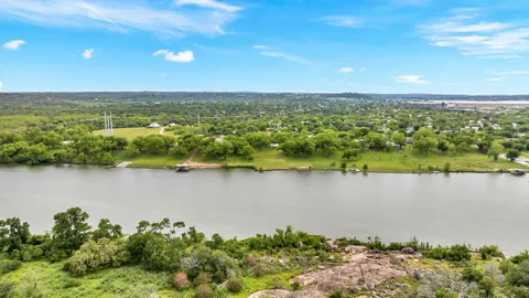 a view of a lake with a city
