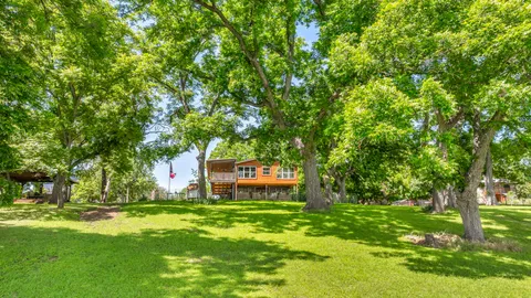 a sign that is sitting in the grass