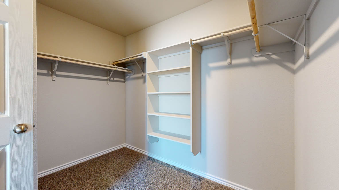 104 Kenzie Street Thorndale, TX 76577 - Photo 13 of 28 a view of an empty walk in closet