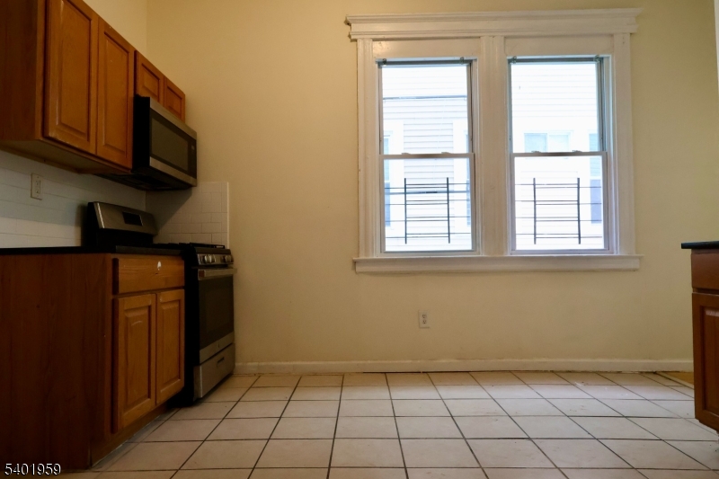 14 Wainwright Street, Unit 1 Newark, NJ 07112 - Photo 4 of 17 a view of an empty room with a window