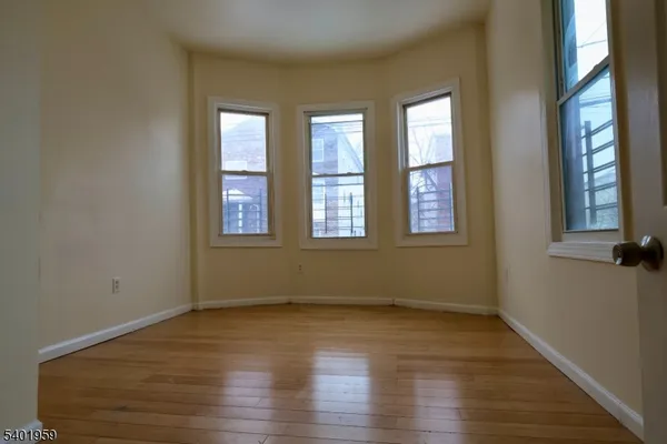 a bathroom with a toilet and bathtub