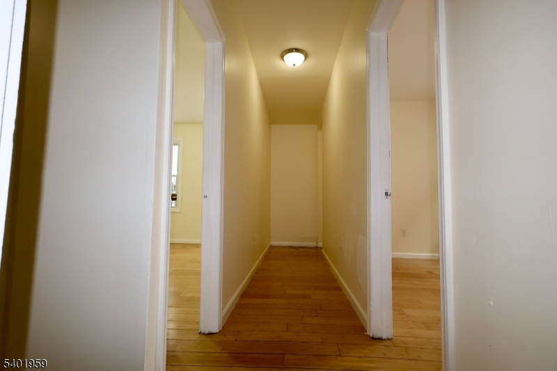 14 Wainwright Street, Unit 1 Newark, NJ 07112 - Photo 10 of 17 a view of a hallway with wooden floor