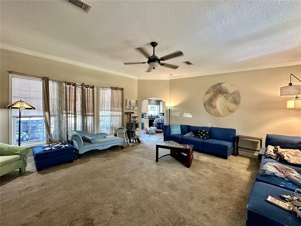 237 Southwest Baron Glen Fort White, FL 32038 - Photo 14 of 30 a living room with furniture and a window