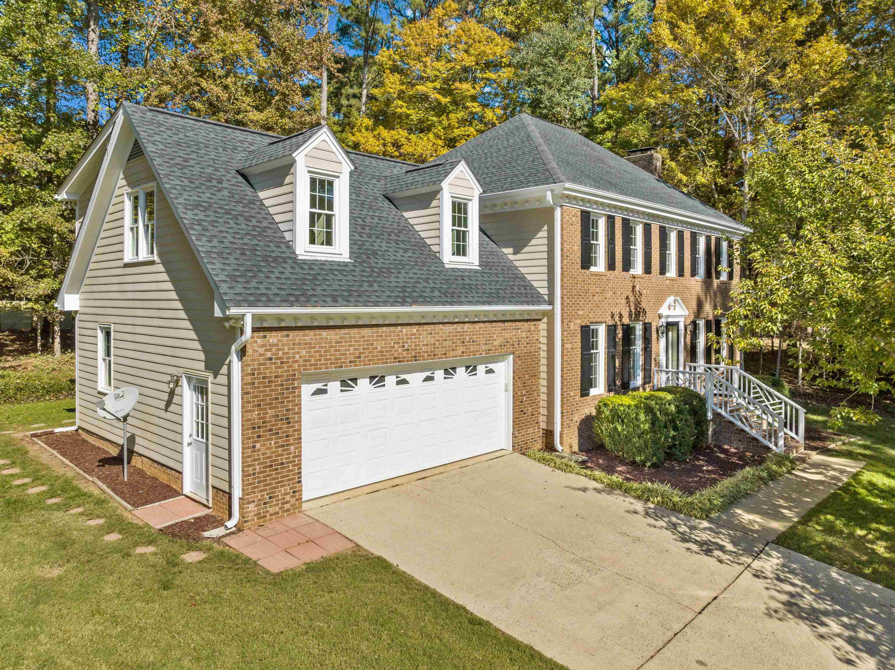 3000 Daventry Lane Raleigh, NC 27613 - Photo 3 of 54 a front view of a house with garden