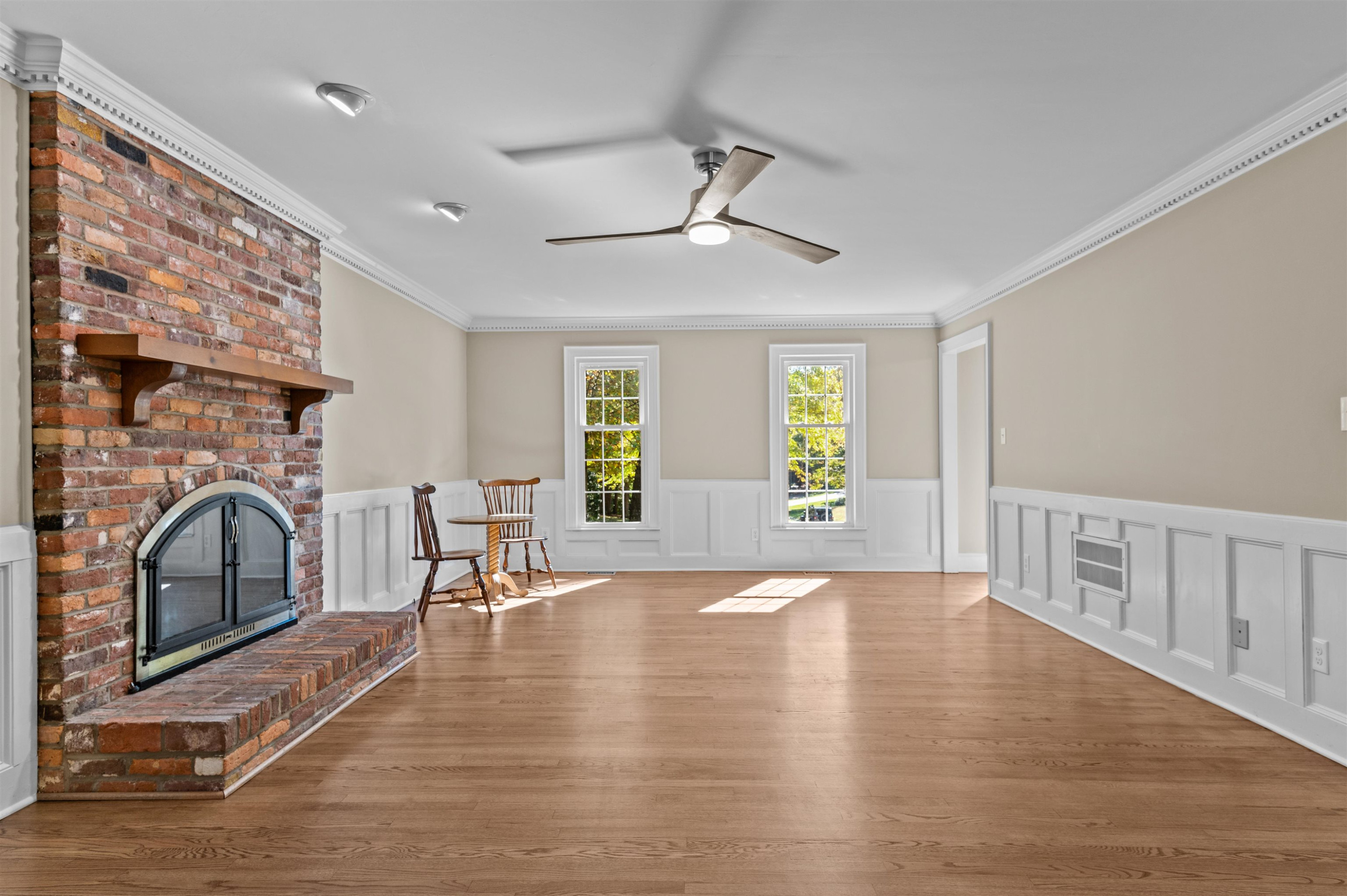 3000 Daventry Lane Raleigh, NC 27613 - Photo 9 of 54 a living room with furniture a fireplace and a table
