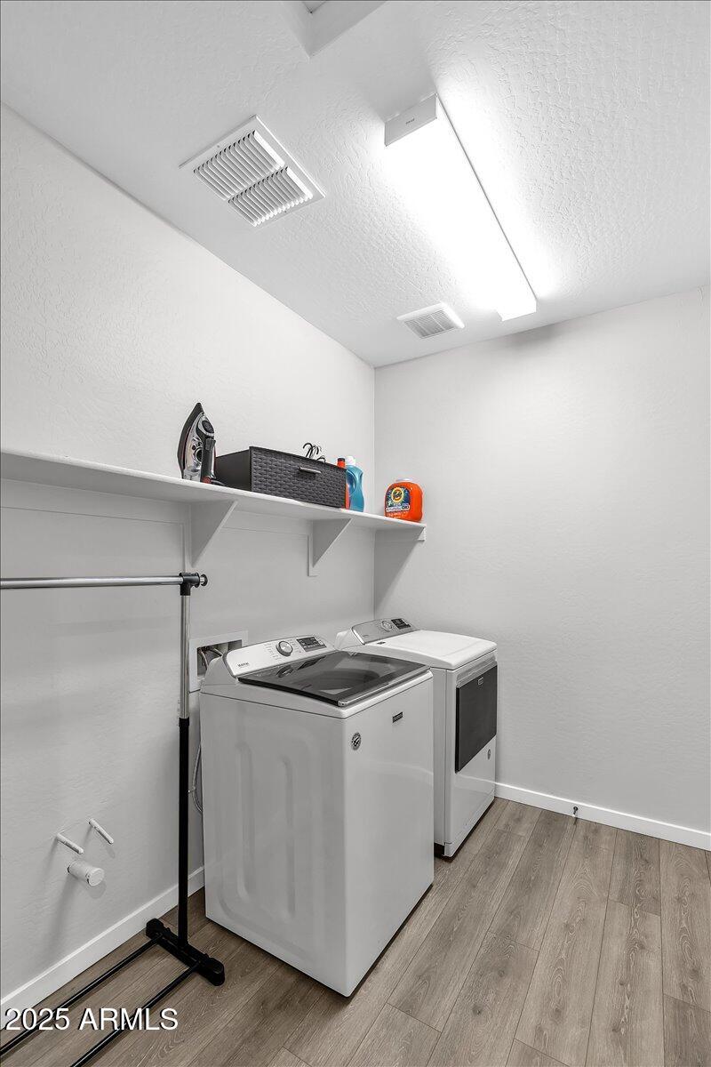 17593 West Red Fox Road Surprise, AZ 85387 - Photo 32 of 55 a utility room with washer and dryer