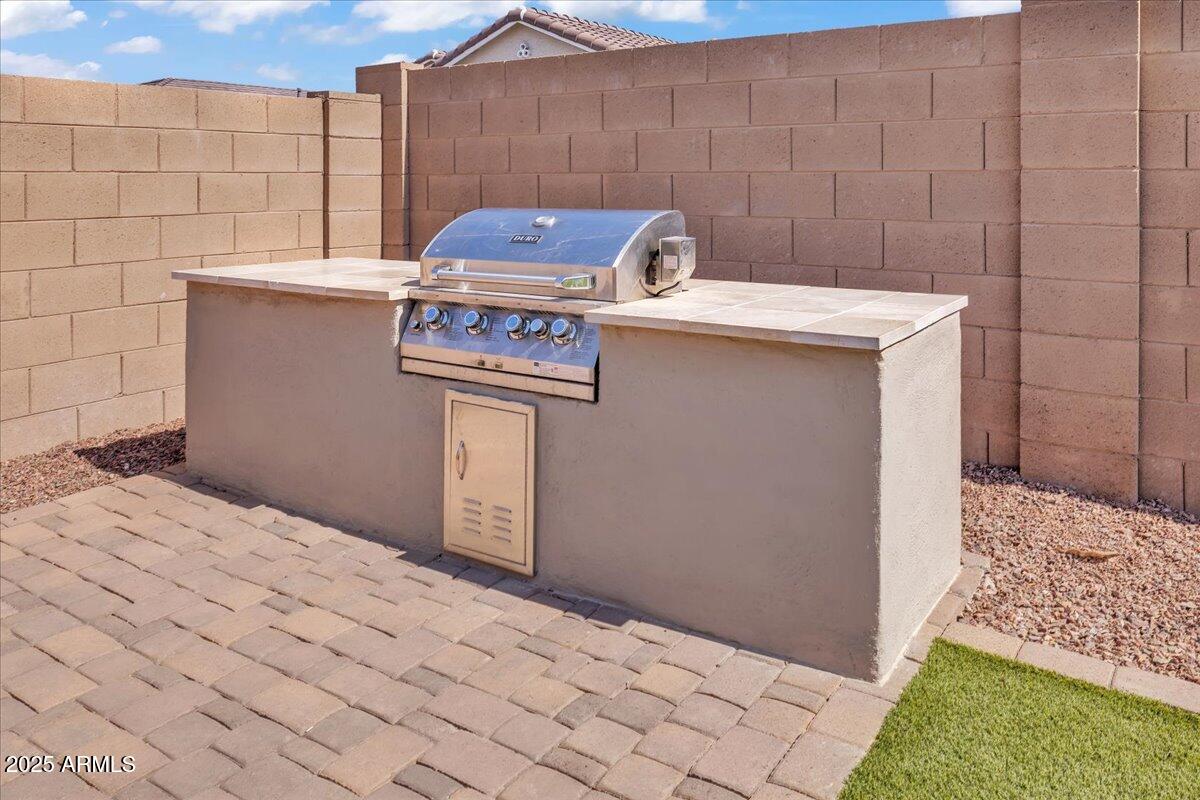 17593 West Red Fox Road Surprise, AZ 85387 - Photo 38 of 55 a utility room with a washer and dryer
