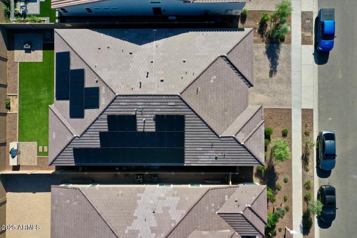 17593 West Red Fox Road Surprise, AZ 85387 - Photo 48 of 55 a view of a house with wooden fence