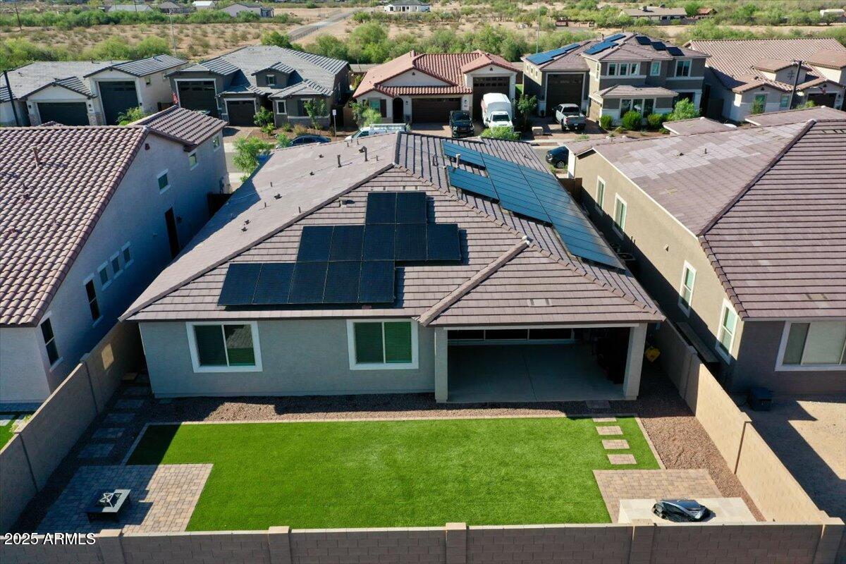 17593 West Red Fox Road Surprise, AZ 85387 - Photo 50 of 55 a front view of a house with a yard