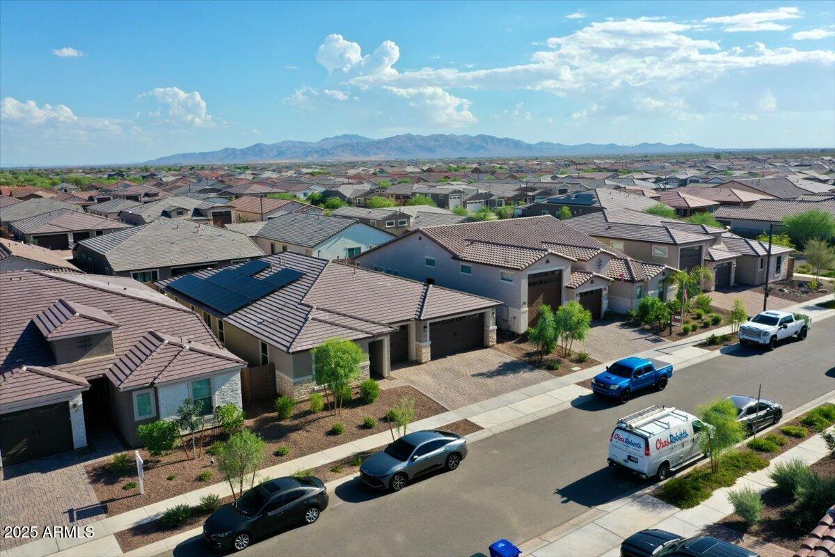 17593 West Red Fox Road Surprise, AZ 85387 - Photo 52 of 55 an aerial view of multiple houses with yard