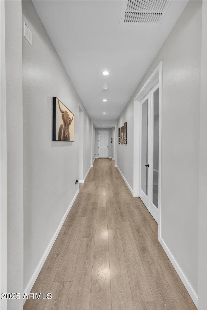 17593 West Red Fox Road Surprise, AZ 85387 - Photo 6 of 55 a view of a hallway