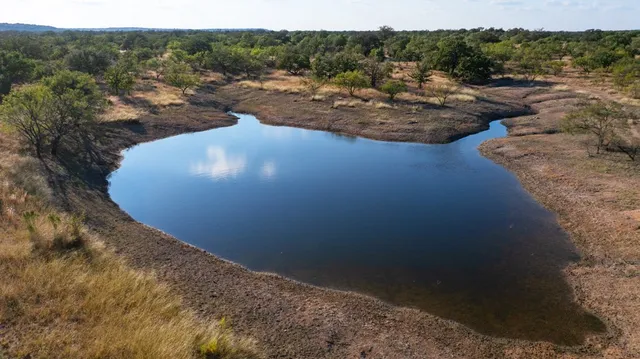 a view of a backyard of a house