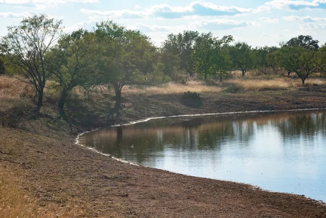 a view of a lake with a mountain