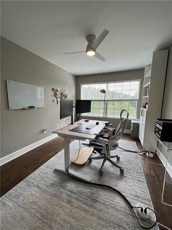 6980 Roswell Road, Unit B6 Atlanta, GA 30328 - Photo 20 of 30 a view of a workspace with furniture and a kitchen
