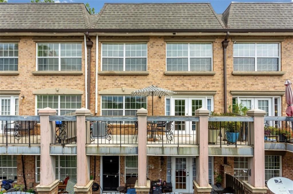 6980 Roswell Road, Unit B6 Atlanta, GA 30328 - Photo 25 of 30 a front view of a building with windows