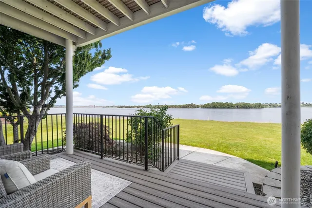 a view of entryway with wooden floor and stairs