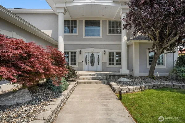 a view of a house with a big yard