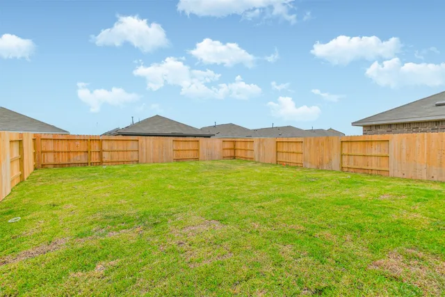 a view of a backyard with garden