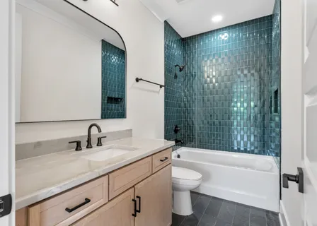 a bathroom with a sink a toilet and a bathtub