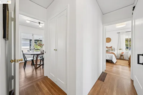 a bedroom with a bed and a lamp