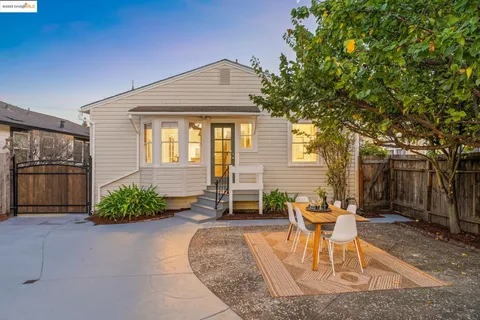a outdoor living space with furniture and a potted plant