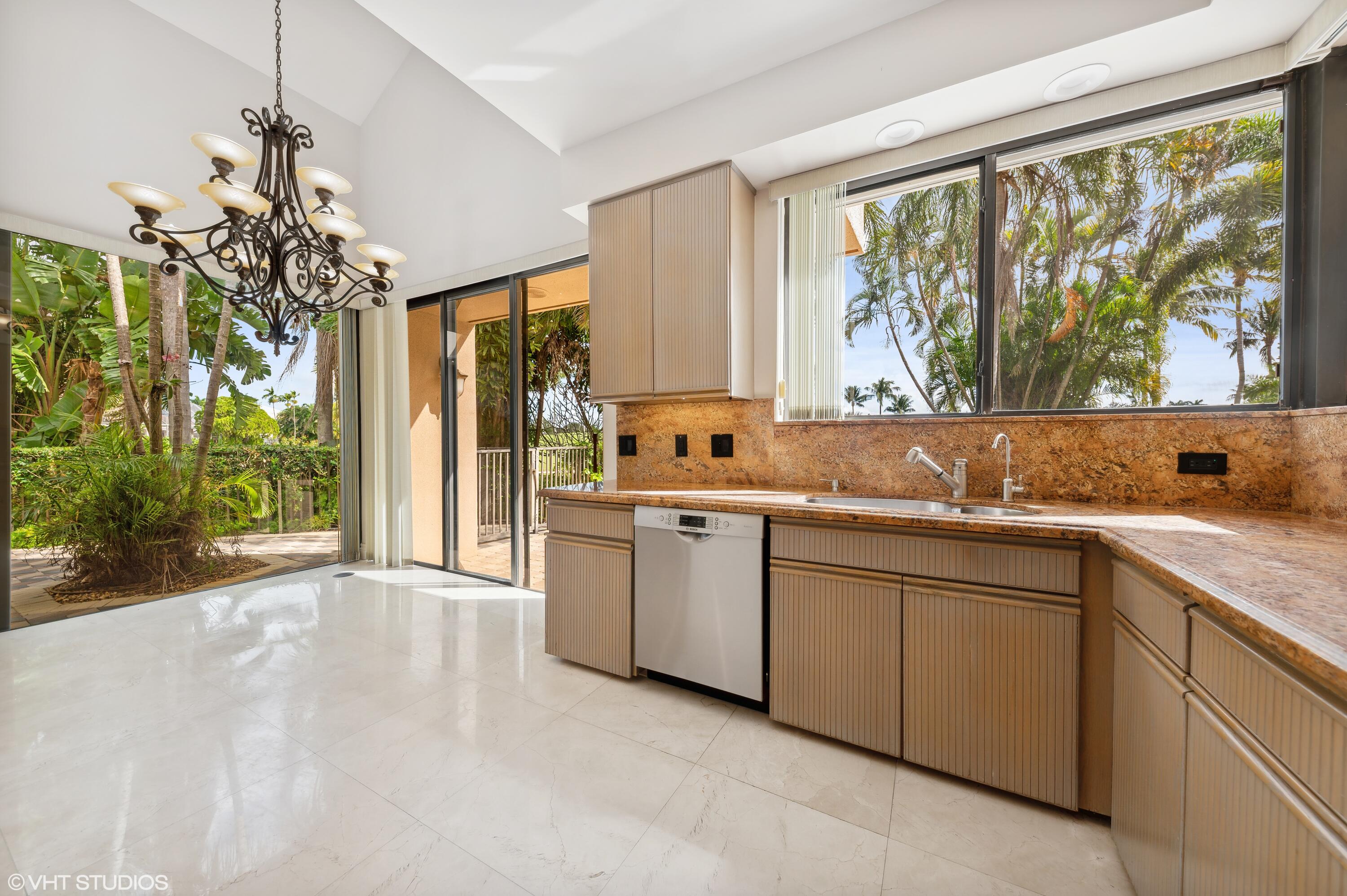7923 Mandarin Drive Boca Raton, FL 33433 - Photo 8 of 37 Kitchen + Breakfast Den
