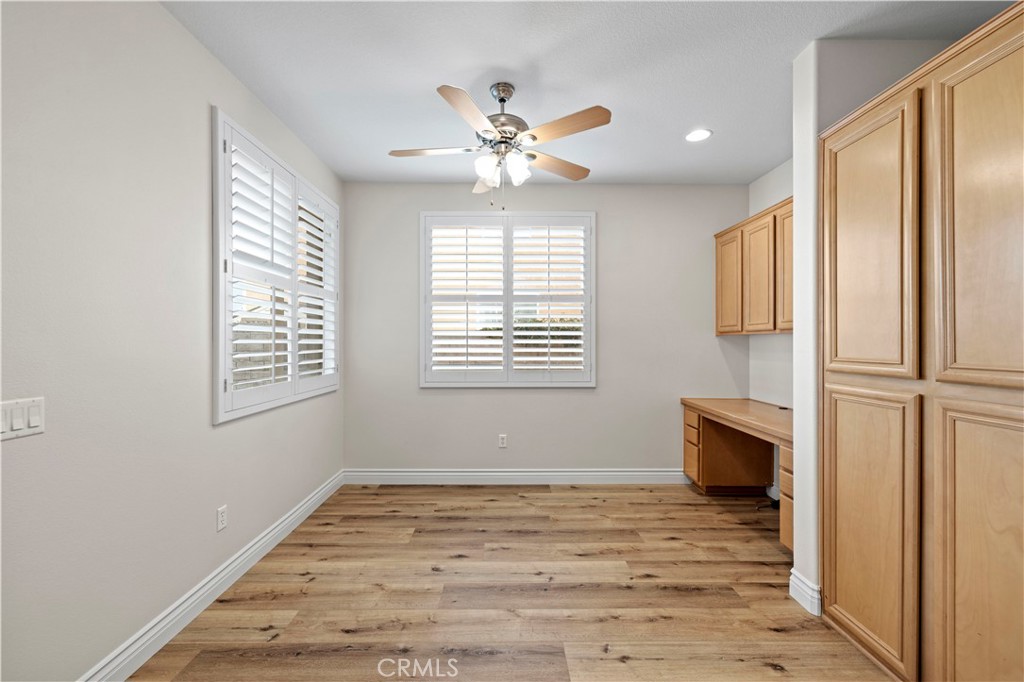 28355 Stansfield Lane Saugus, CA 91350 - Photo 17 of 52 a view of an empty room with a window and ceiling fan