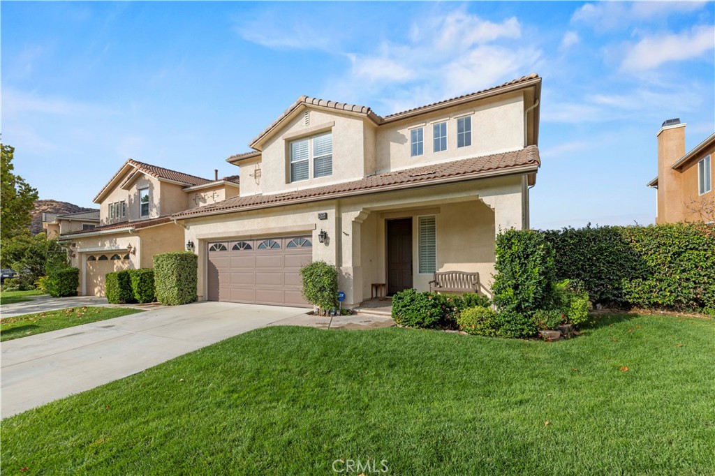 28355 Stansfield Lane Saugus, CA 91350 - Photo 2 of 52 front view of a house with a yard