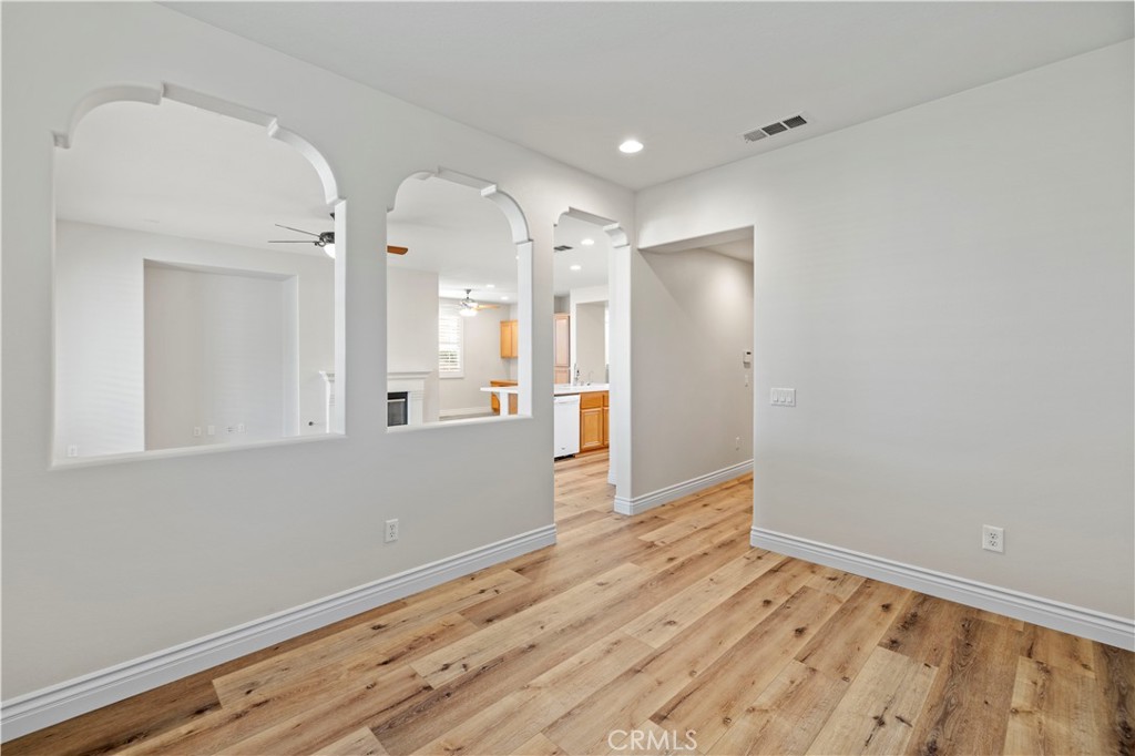 28355 Stansfield Lane Saugus, CA 91350 - Photo 21 of 52 a view of a hallway with wooden floor