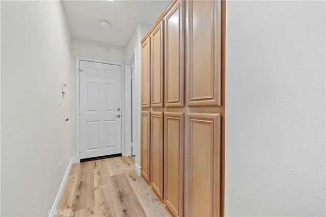a bathroom with a granite countertop sink toilet a mirror and shower