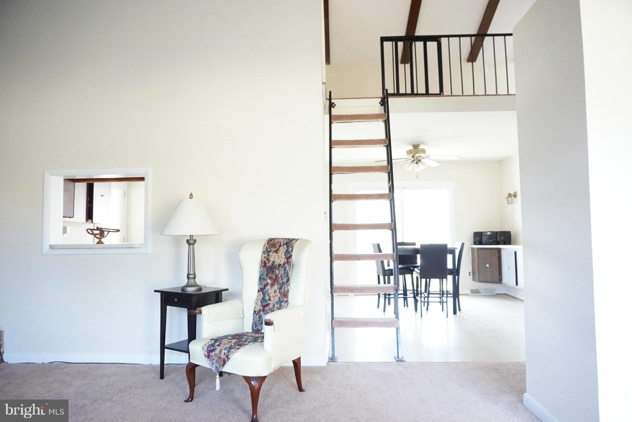 11670 Perry Branch Road Newburg, MD 20664 - Photo 11 of 30 a view of a livingroom with furniture and a window