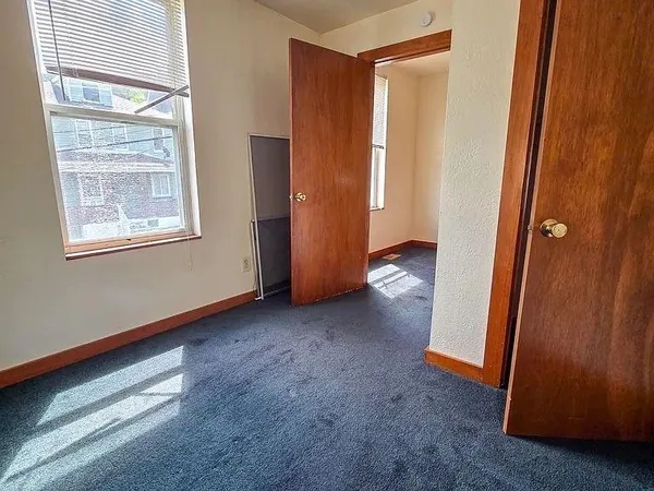 an empty room with windows