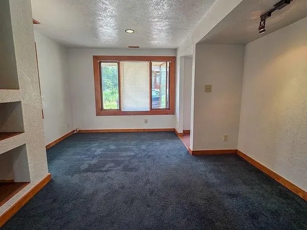 an empty room with windows