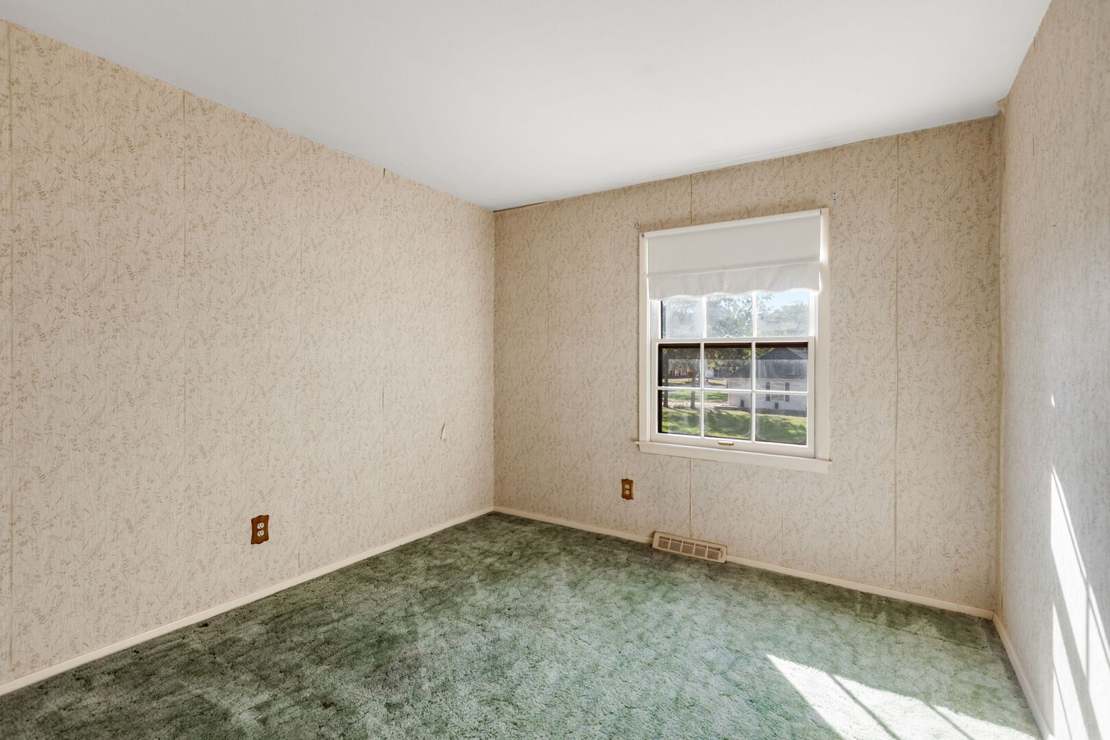 47 Old Post Road Montgomery, IL 60538 - Photo 12 of 32 a view of an empty room with a window