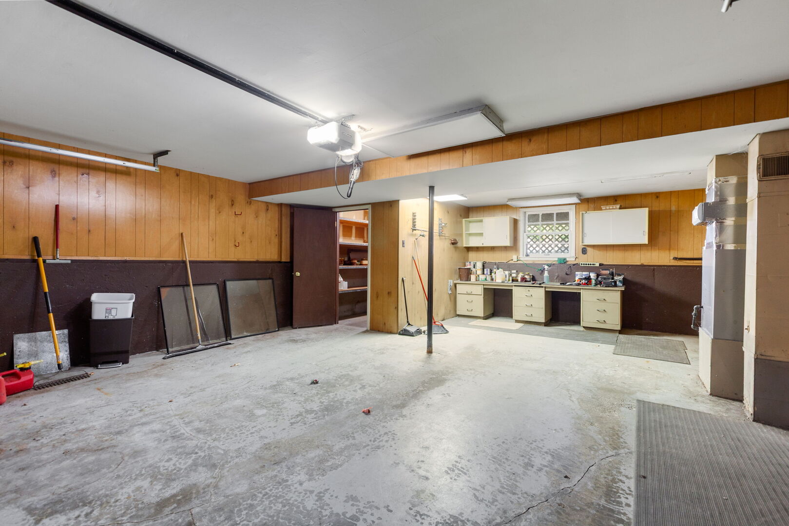 47 Old Post Road Montgomery, IL 60538 - Photo 21 of 32 a large parking space with lot of cabinets