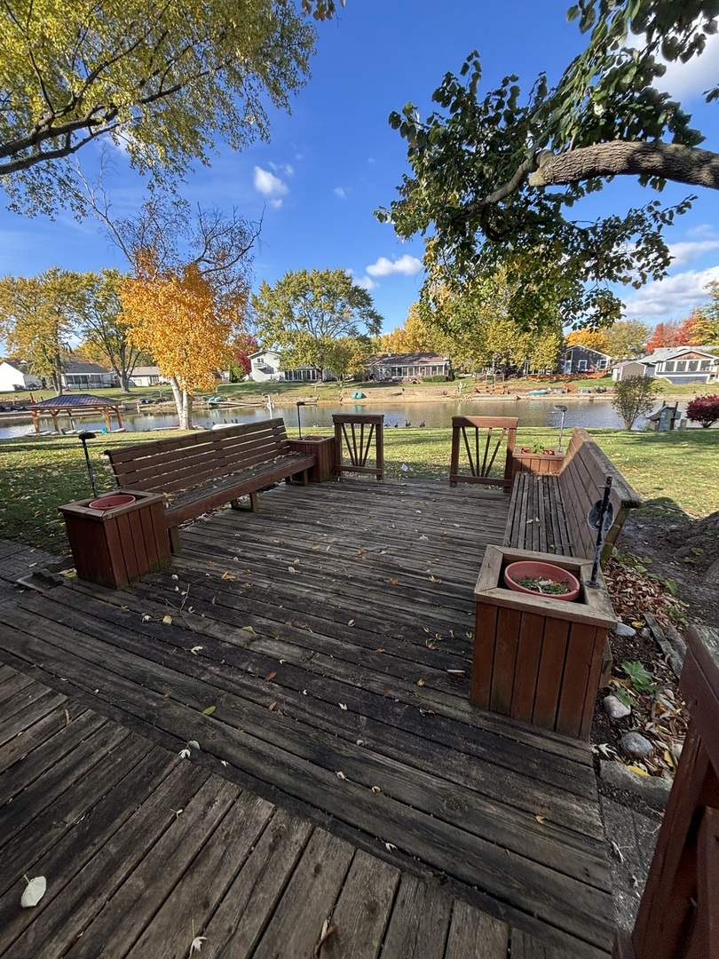 47 Old Post Road Montgomery, IL 60538 - Photo 26 of 32 a view of a balcony with wooden floor and outdoor space