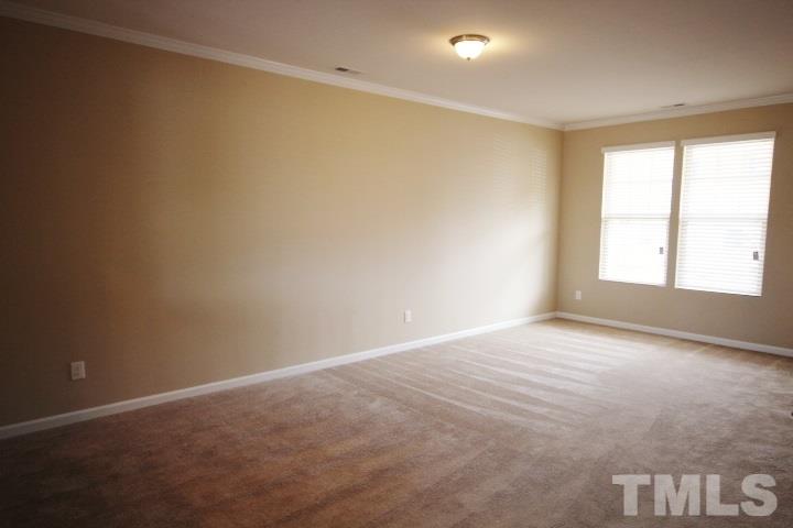 3518 Midway Island Court Raleigh, NC 27610 - Photo 9 of 10 a view of an empty room with a window