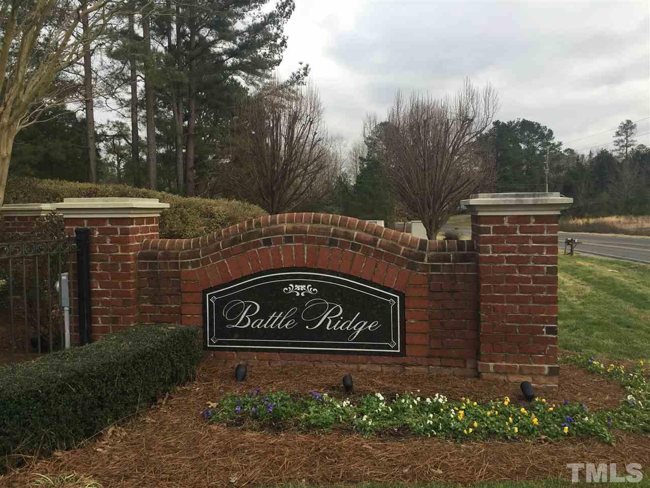 3518 Midway Island Court Raleigh, NC 27610 - Photo 10 of 10 a view of a brick house next to a yard